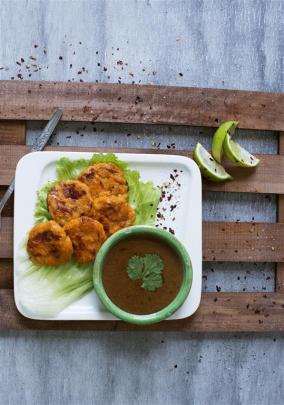 Llapingachos (kumara and cheese patties with peanut sauce).
