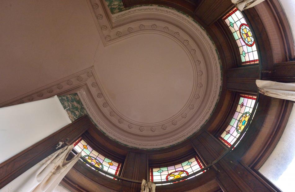 Stained glass fanlights feature on the ground floor in the space under the turret. PHOTO: GERARD...