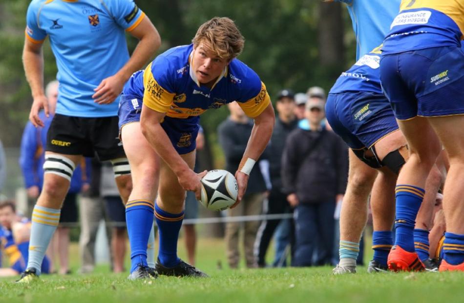 Taieri move the ball quickly to the backs during an attacking phase in the second half. Photo:...