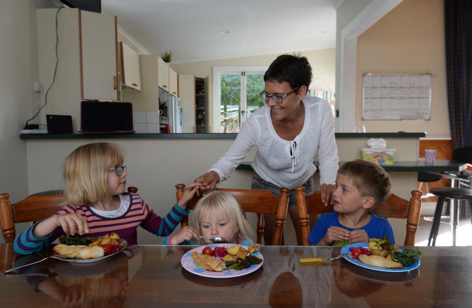 Wal Herring puts theory into practice with her children (from left) Huxley (7), Eckhart (2) and...