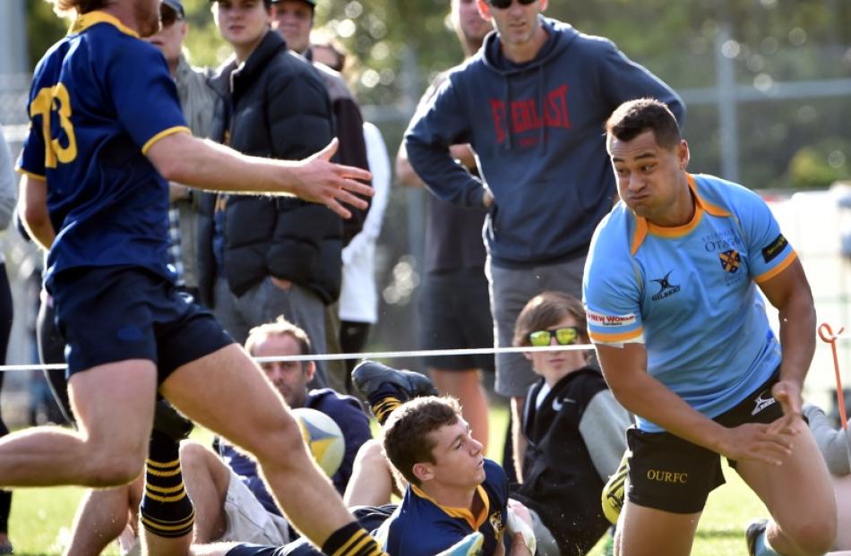 Action from today's match between Dunedin and University. Photo: Peter McIntosh
