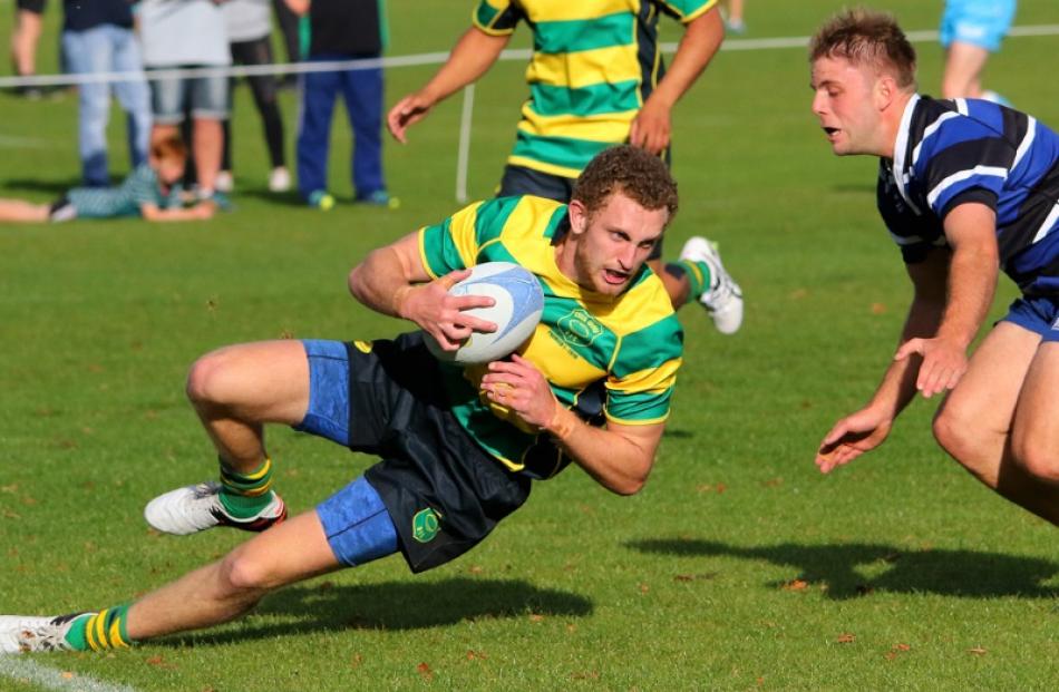 Action from today's match between Kaikorai and Green Island. Photo: Caswell Images
