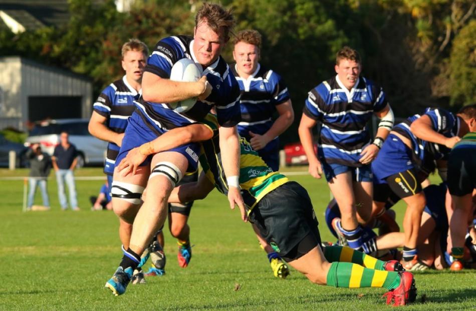 Action from today's match between Kaikorai and Green Island. Photo: Caswell Images