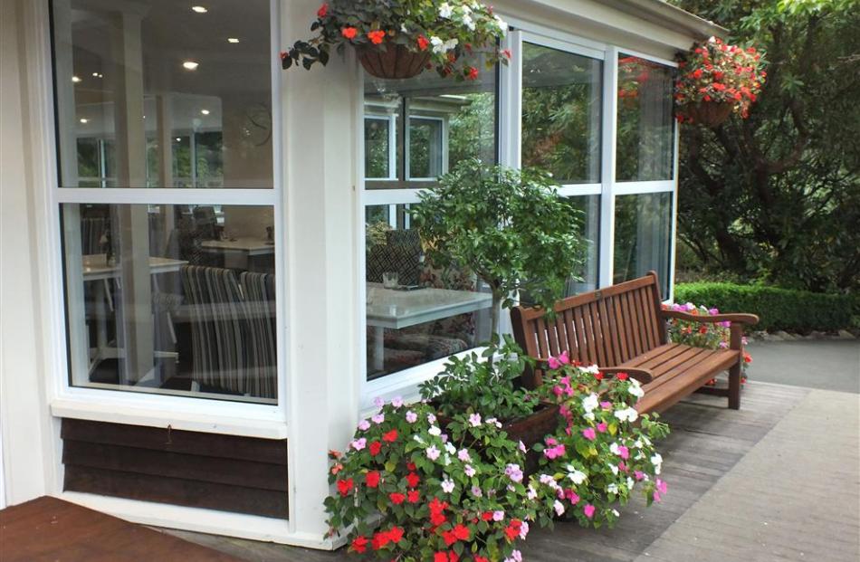 Hanging baskets outside the cafe.