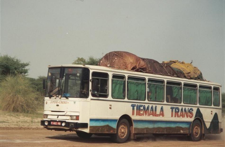 Discards of the West, old cars, trucks and buses are a means of cheap transport.