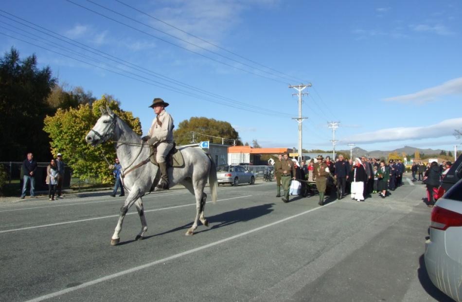 Glynne Smith, of Ranfurly on Jimmy, leads the Anzac parade at Omakau, which focused on the Battle...