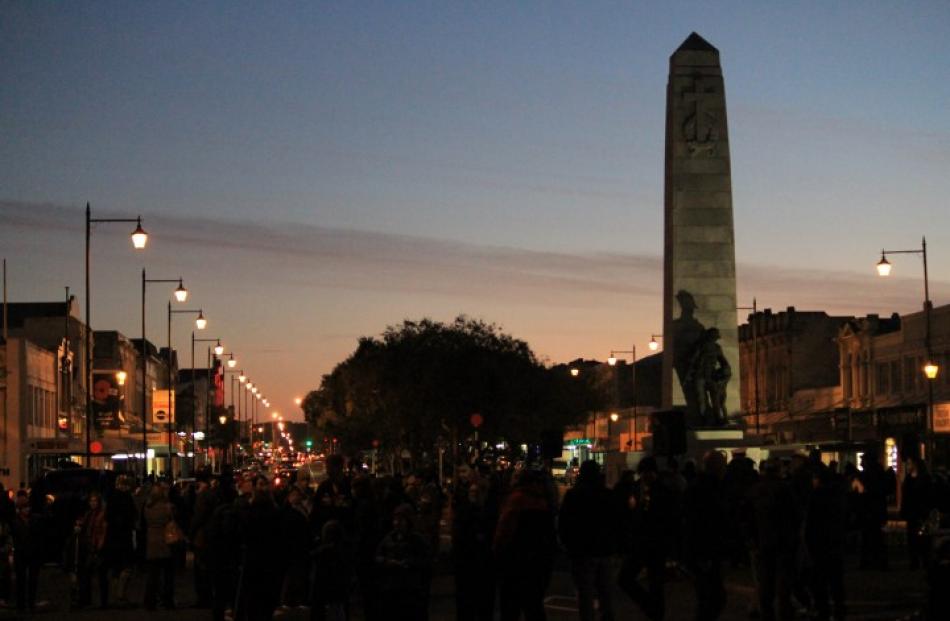 The crowd disperses after the dawn service in Oamaru this morning. Photo Hamish MacLean