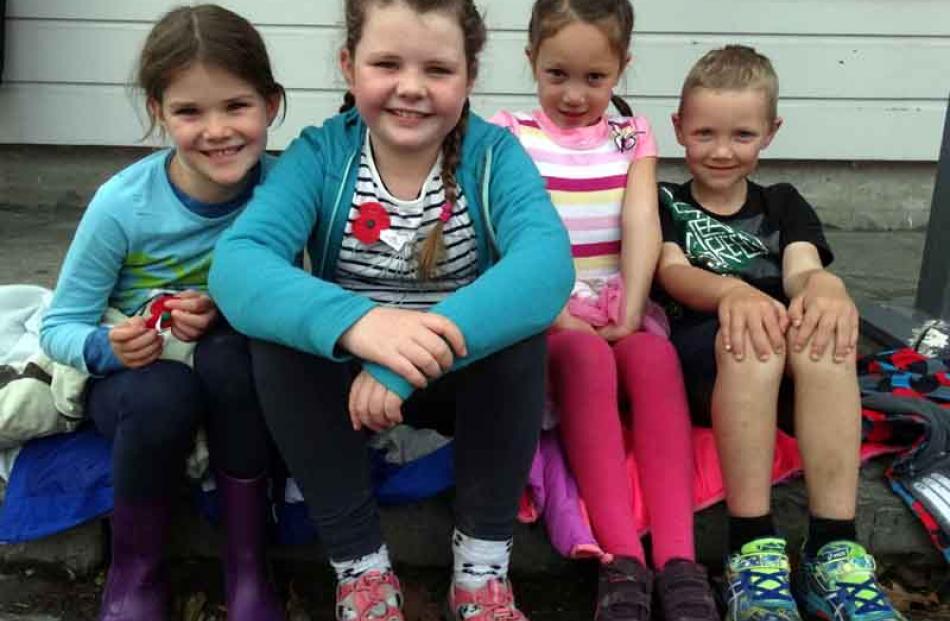 Heather Jackson (7) and Flora Jackson (8) of Winton with Addie TeHuna[correct] (4) and Mason...