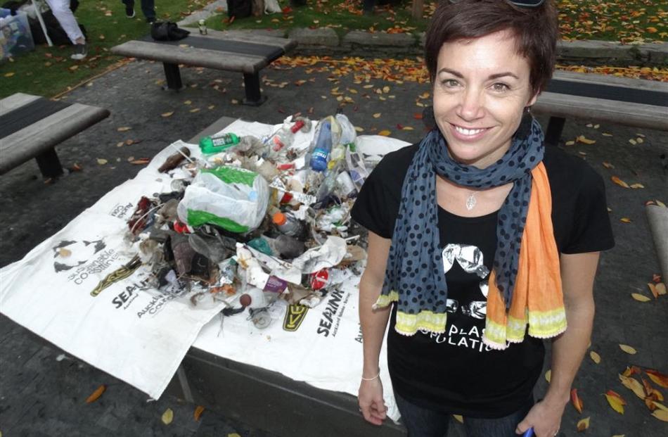 Ban the Bag Queenstown co-ordinator Esther Whitehead displays a mound of beach rubbish. Photo by...