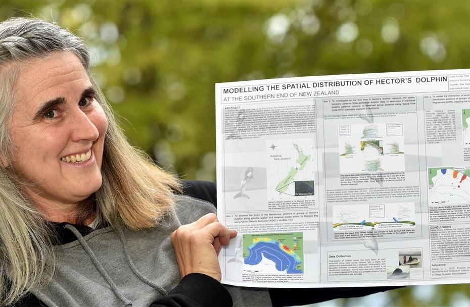 New Zealand Esri young scholar of the year Judy Rodda with her poster showing the spatial...