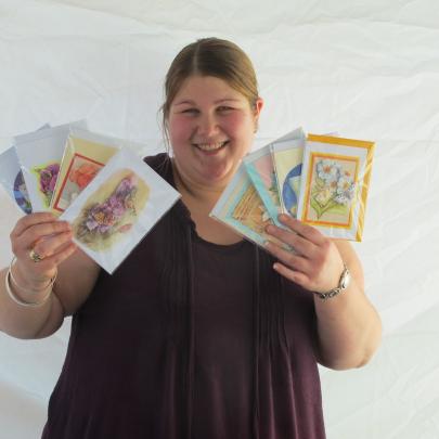 Nicole Broekhuyse, of Saddle Hill, creates Dutch-style paper tole 3-D gift cards.