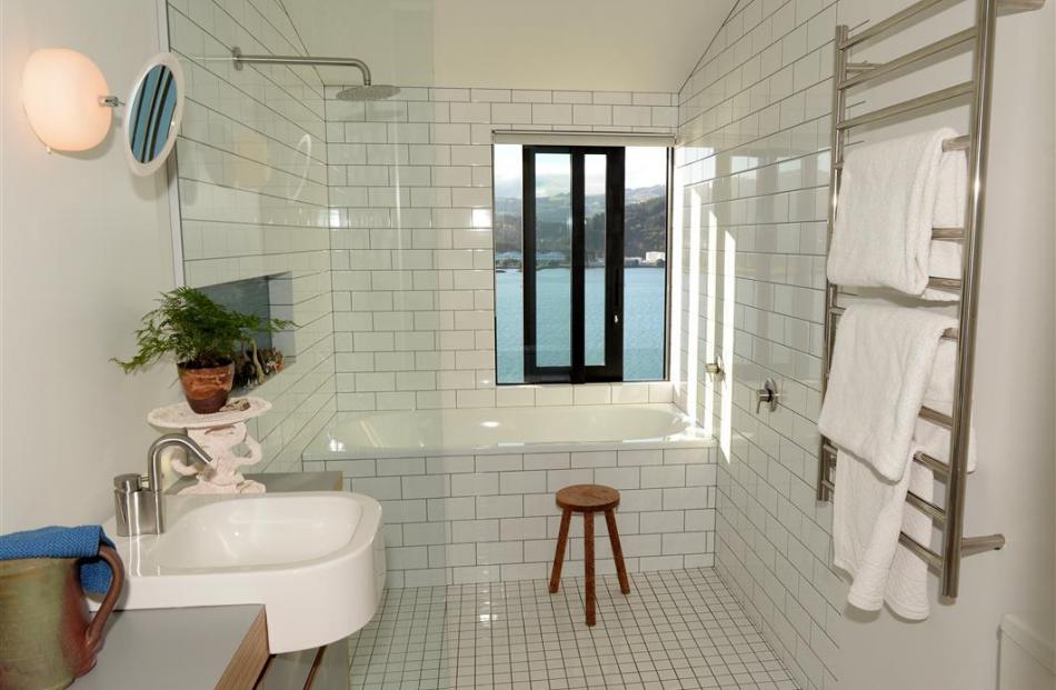 Being only one room wide, the house has water views from every area, including the bathroom.