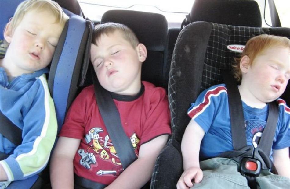 Let sleeping boys sleep . . . Exhausted after a day at the Otago Museum’s tropica rainforest and...