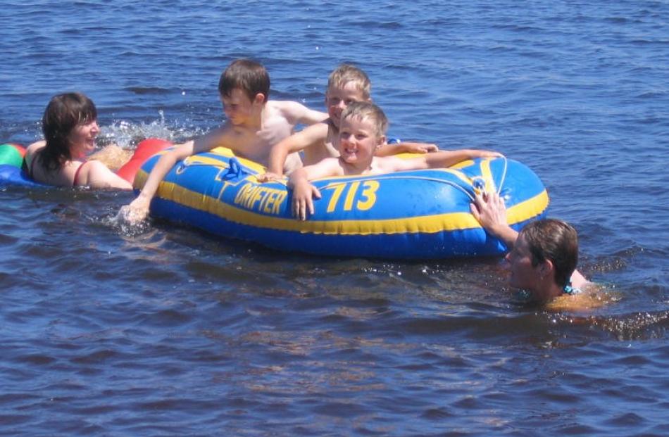 This is so cool . . . From left, Justine and Leo Ralston (7), Nicholas (6), Jonathon (4) and Liz...