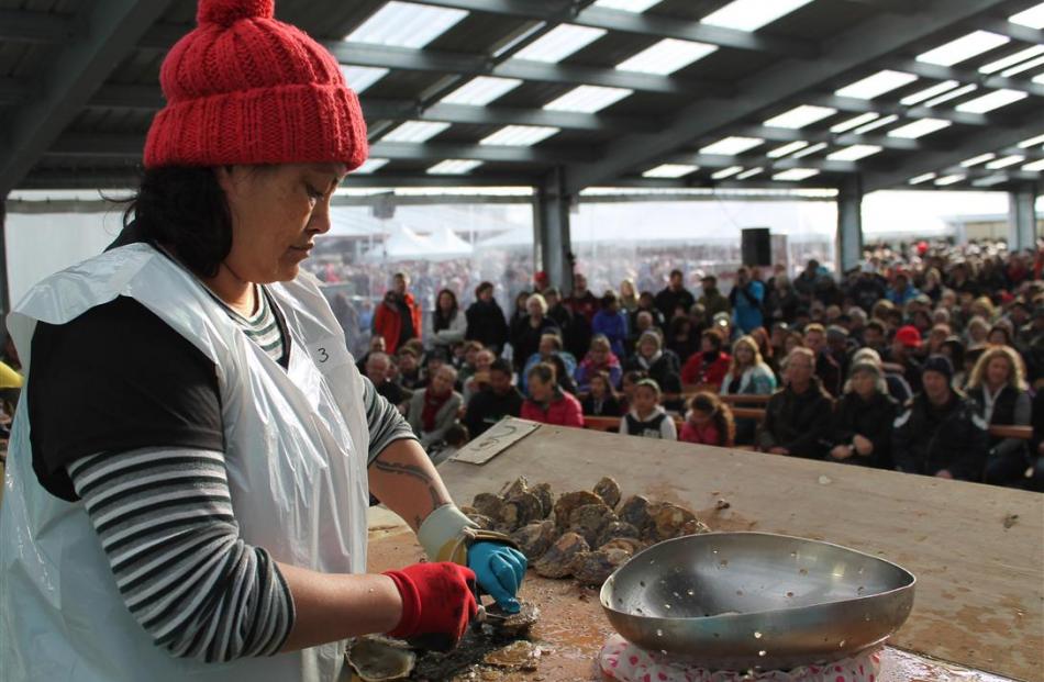 Here Witehira, of Barnes Wild Bluff Oysters, competes in the women’s oyster opening competition.