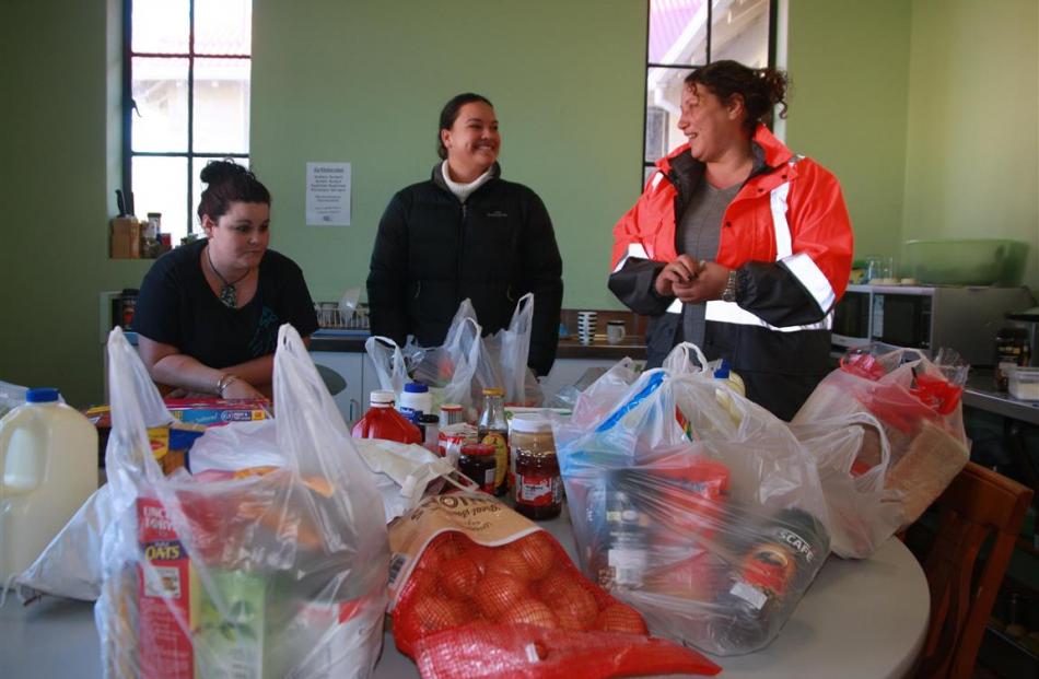 Working on meal plans for  demolition workers in the former  tuberculosis  annexe are (from left)...