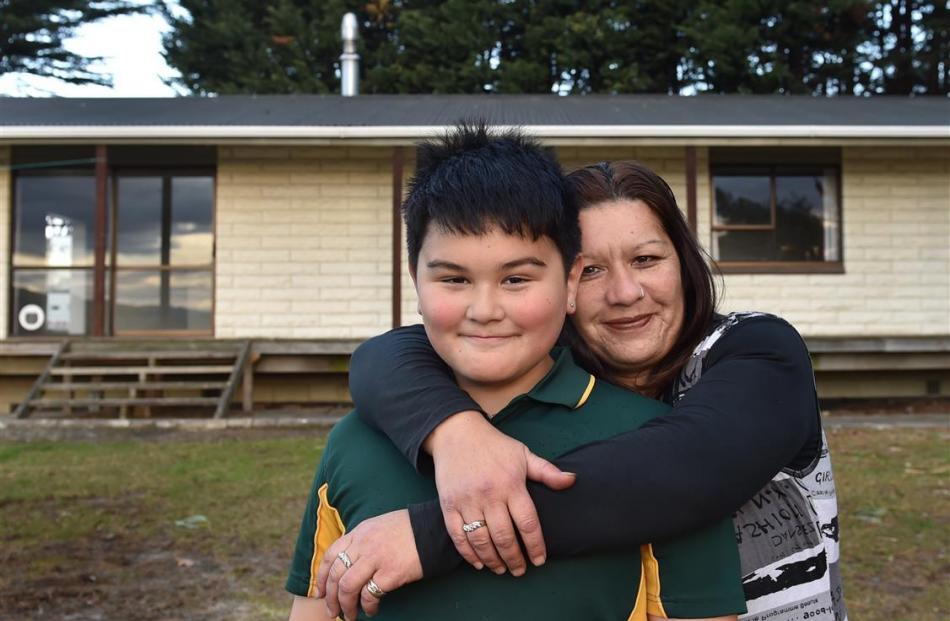 Green Island resident Tina Conway is happy to be living with her son Ariki (9) again after...