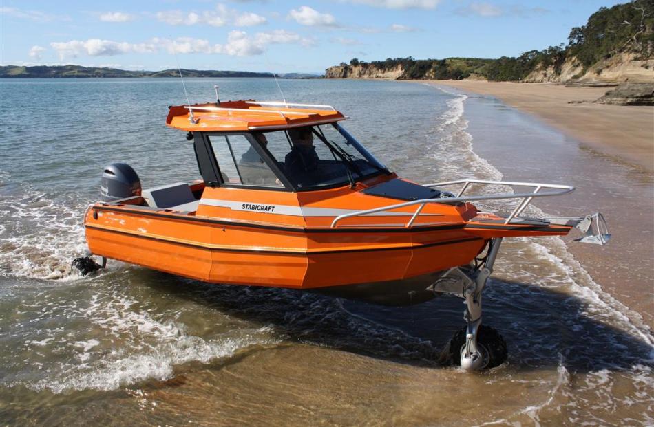 A Sealegs amphibious craft about to drive on to land.