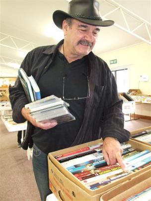 Mike Fraser, of Alexandra, makes his second visit to the Cromwell book sale. PHOTOS: LYNDA VAN...