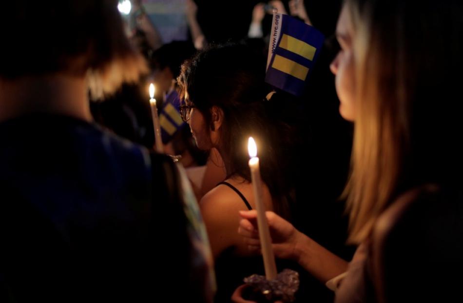 In Washington, a vigil was held for victims of the nightclub shooting. Photo: Reuters