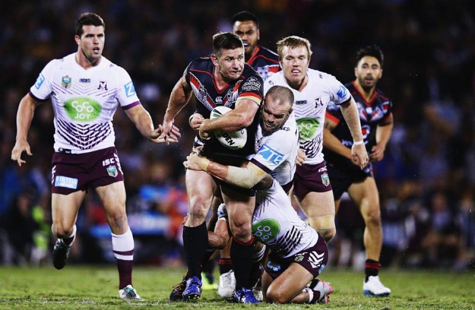 Jacob Lillyman on the run for the Warriors. Photo: Getty Images