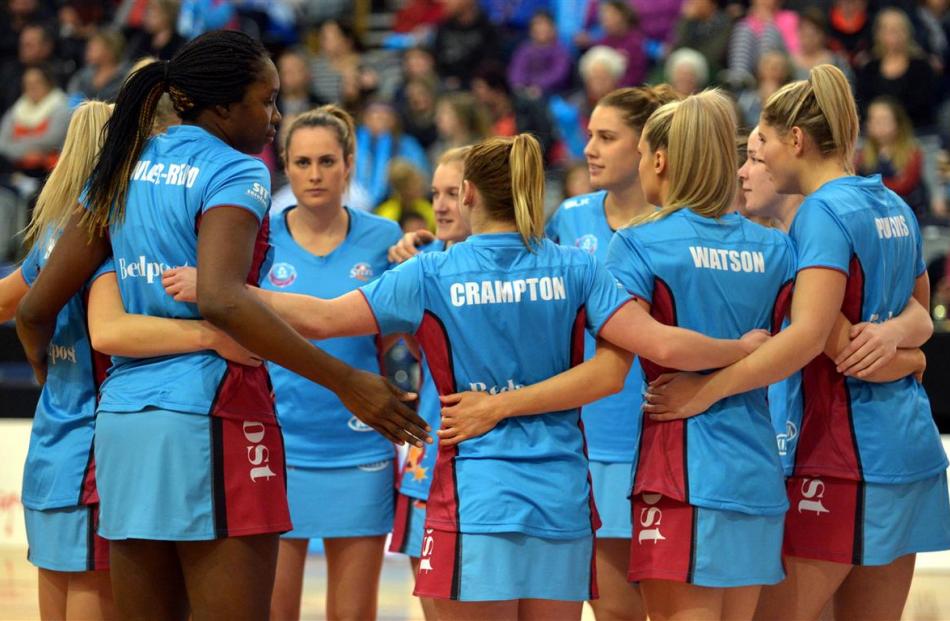 Crampton participates in the pre-game team huddle