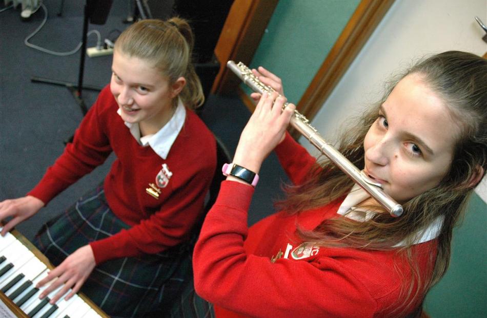 Kayla Muirhead (piano) and Cody Hickling (flute), of Kaikorai Valley College, prepare to enter...