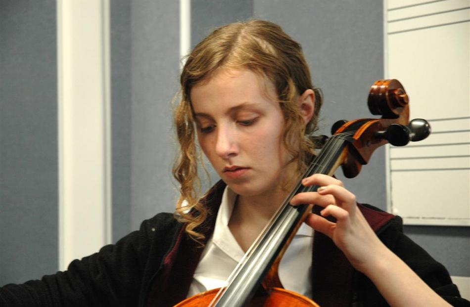 Rosa Miller is all concentration on the cello.