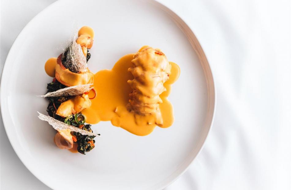 Lobster groundnut stew, efo riro, eba crisp. PHOTO: COURTESY OF MICHAEL ELEGBEDE