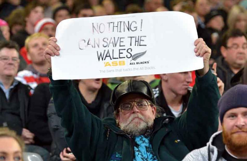 An All Blacks supporter sends a message to the Welsh.