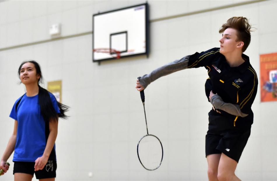 Kavanagh College badminton players Philomena Talalima (15) and Brayden Mansfield (14) in action...