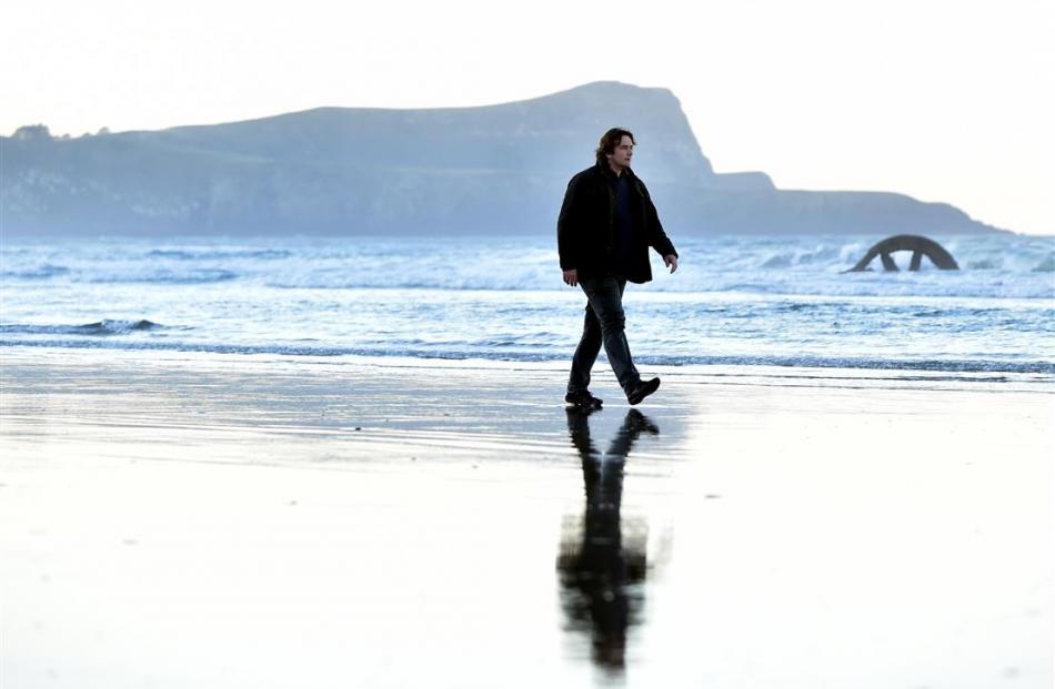 University of Otago department of surveying lecturer Dr Tony Moore at an Otago Peninsula site...