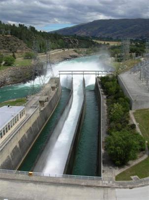 Water gushes from the Contact Energy's Roxburgh hydro dam on January 4, during a controlled...