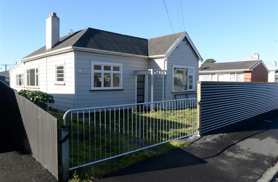 The uninhabitable home at 38 Richmond St, Forbury, which the owner wants to demolish. Photo by...