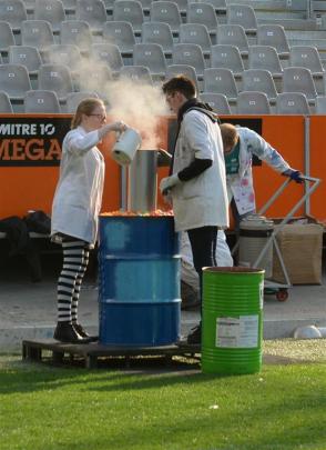 University of Otago  chemistry student Jasmine Seifert-Simpson pours in the hot water, while...