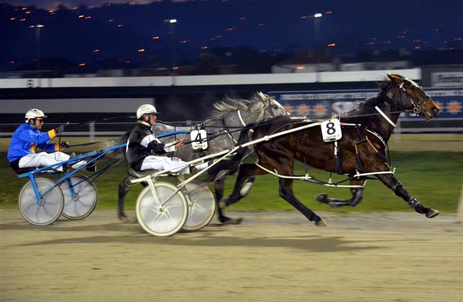 Itz Risky Business, driven by John Dunn, holds out Silver Dale to win a 2200m maiden mobile pace...