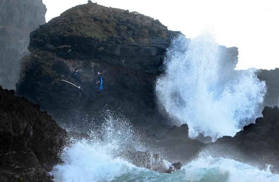 Tahu Nikora (left), of Dunedin, and Theo Montel, of Sweden, wait to be rescued off Maori Head...