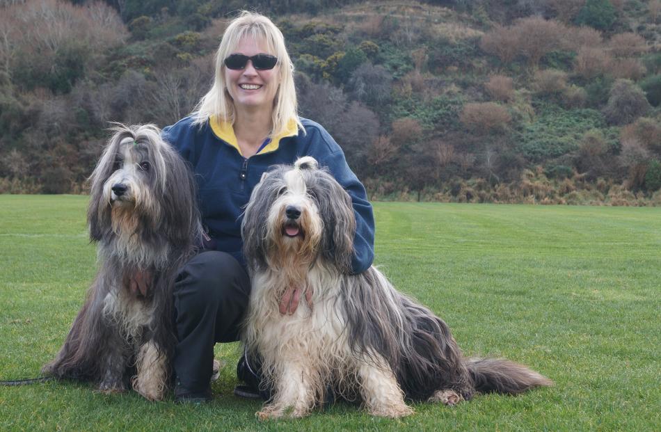 Dog owner Diana O’Kane at Forrester Park with dogs Echo (left) and Evie has raised concerns about...