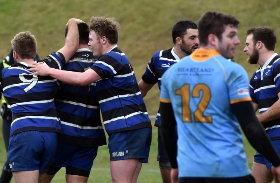 Action from today's Kaikorai v University match. Photo: Peter McIntosh