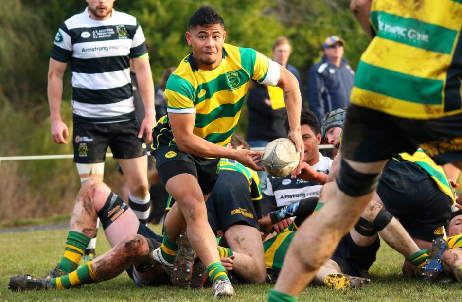 Action from today's match between Southern and Green Island. Photo: Caswell Images