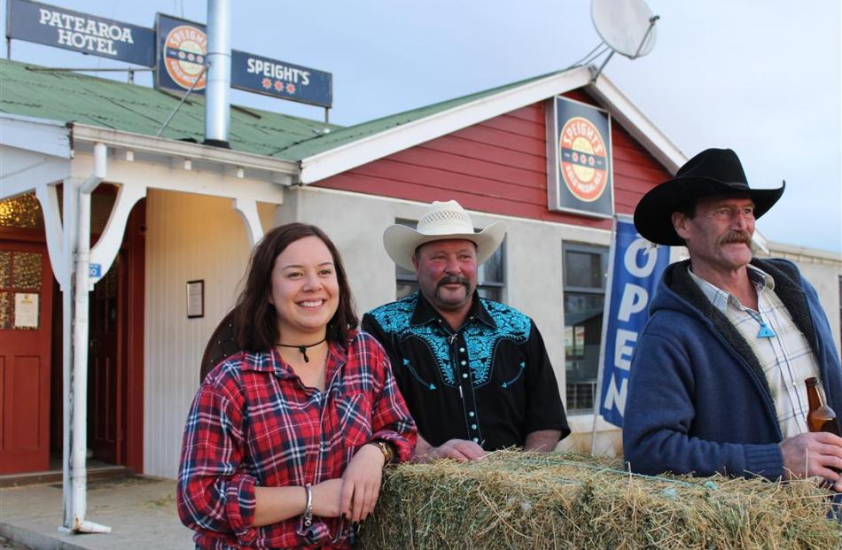 Publican Sammy Hawea (left), Verdon Reid and Larry Williamson, all of Patearoa, adopt western...