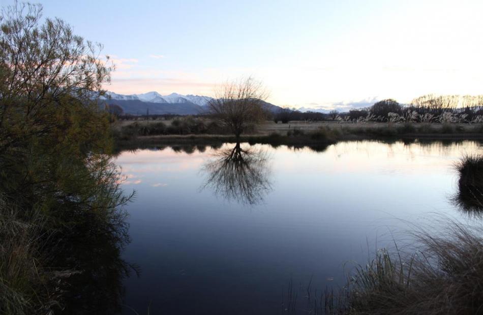 Matuka Lodge in Twizel looks out over a river-fed pond and on towards the Southern Alps.