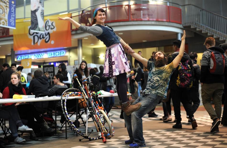 Adele Cleverley (26, left) and Josh Smith (24), of the Fire and Circus Club, get into the mood at...