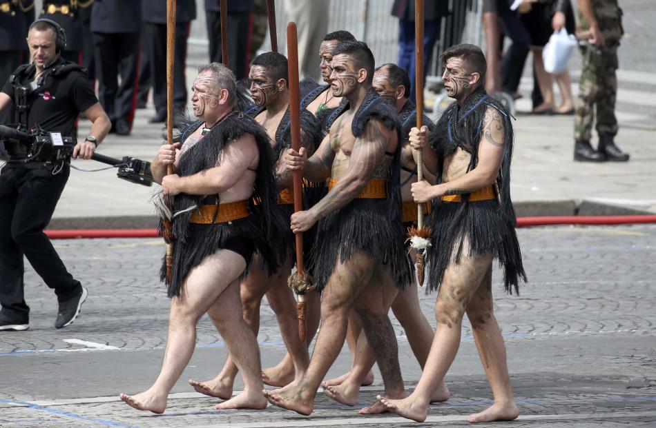 Maori warriors also took part in the Bastille Day parade.  Photo: Reuters