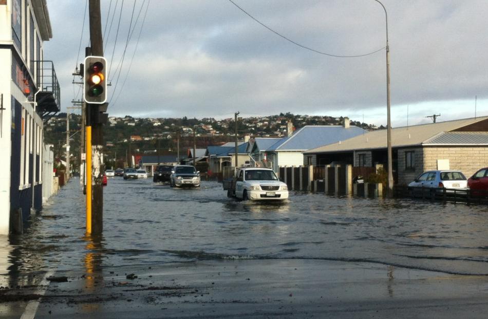 Flooding at the intersection of Bayview Rd and Prince Albert Road. Photo ODT
