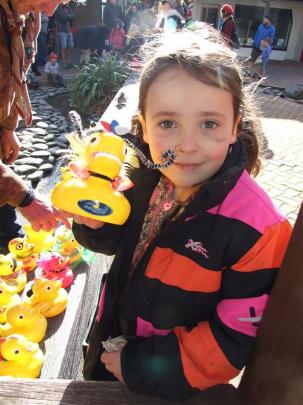 Mischa Thomlinson (6), of Cromwell, proudly displays her decorated duck. Photos by Lynda van Kempen.