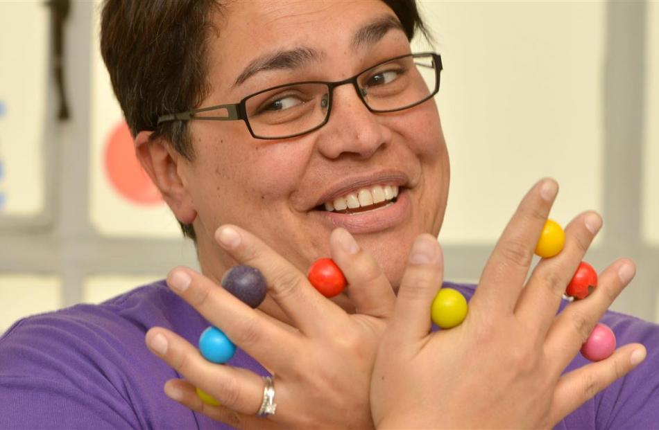 Cadbury events and Cadbury World manager Kylie Ruwhiu-Karawana shows off coloured Jaffas from...