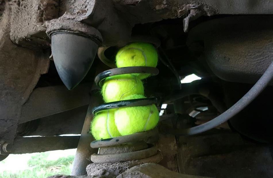 Tennis balls provide a ‘‘MacGyver fix’’ for the suspension.