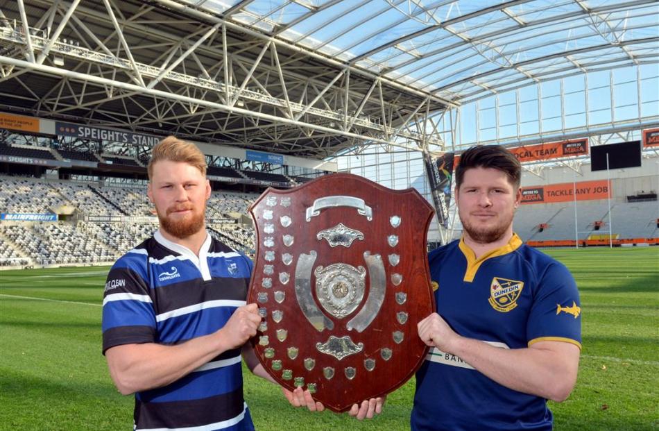 Kaikorai captain Blair Tweed (left) and Dunedin skipper Mark Grieve-Dunn get an early touch of...