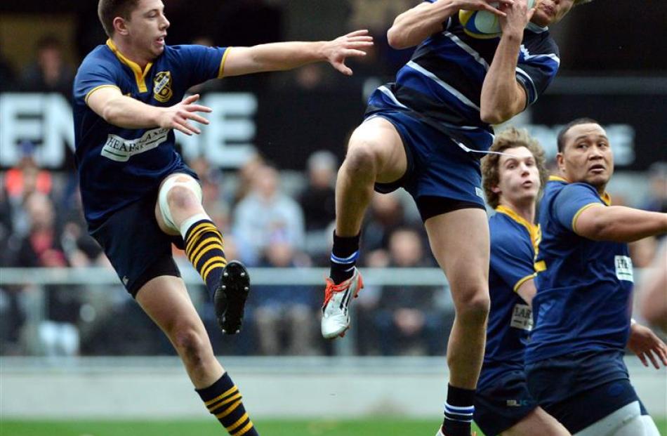 Kaikorai wing Danny Van der Voort is safe under the high ball as he is challenged by Dunedin’s...